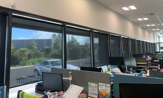 Commercial office building sunscreen roller blinds